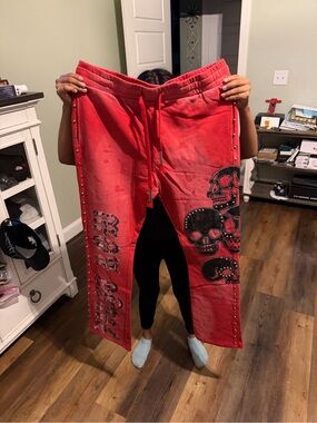 Red Skull Graphic Jogger Sweatpants with Stud Accents